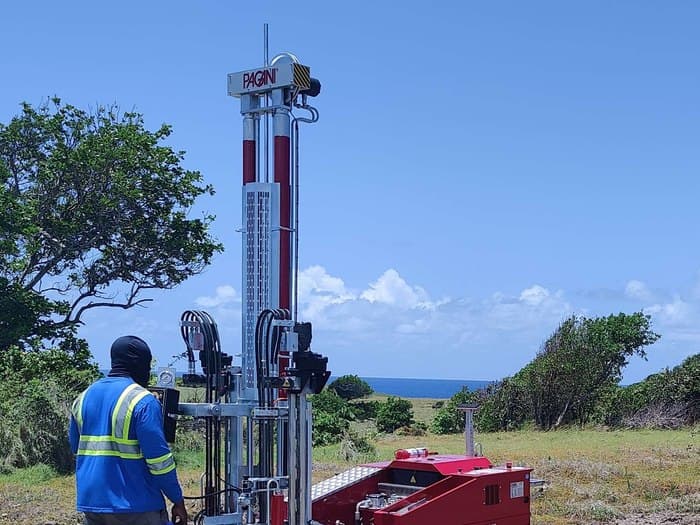 GID technician operating a Pagani rig with the ocean in the background for the Satellite Network Portal investigation