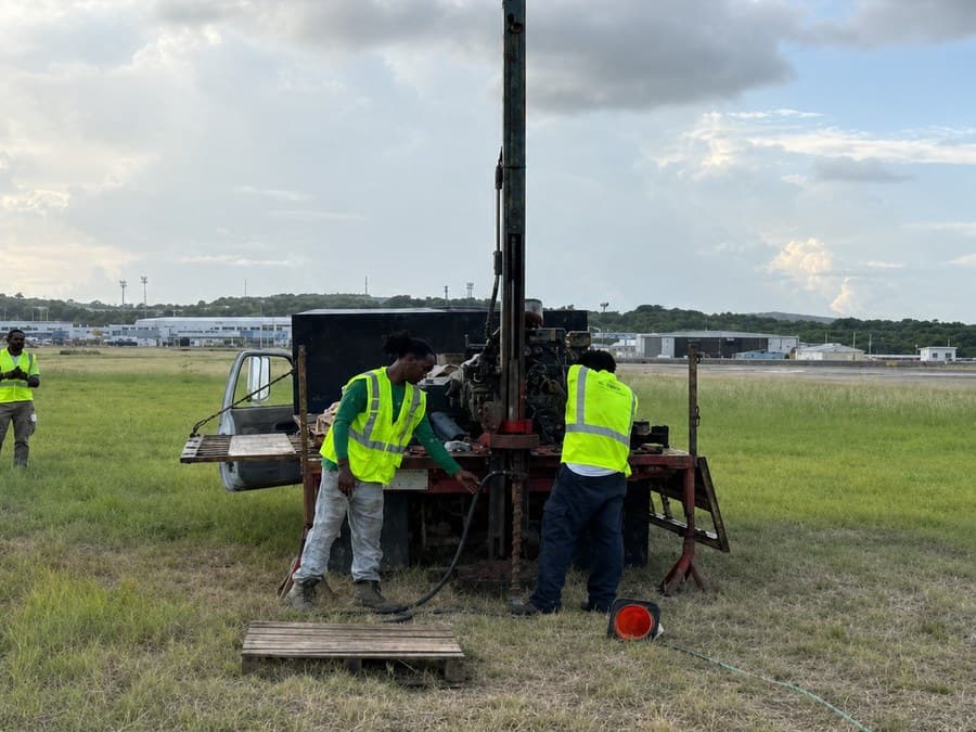 GID field crew operating a drill rig on the airfield at V.C. Bird International Airport, Antigua